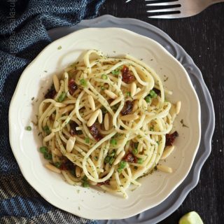 Lime Garlic Spaghetti with Onion Scapes & Dried Tomatoes